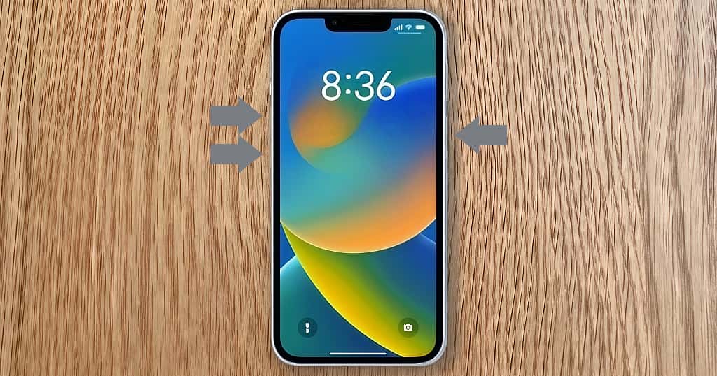 iPhone, dengan tanda panah yang menunjukkan posisi tombol volume dan daya, digunakan untuk mengilustrasikan cara memaksa memulai ulang iPhone saat macet atau tidak responsif