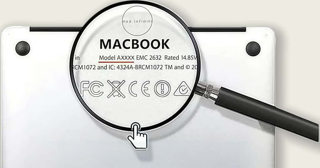 Tampilan kaca pembesar bagian bawah MacBook yang menunjukkan cara menemukan nomor model dan seri pada MacBook Pro